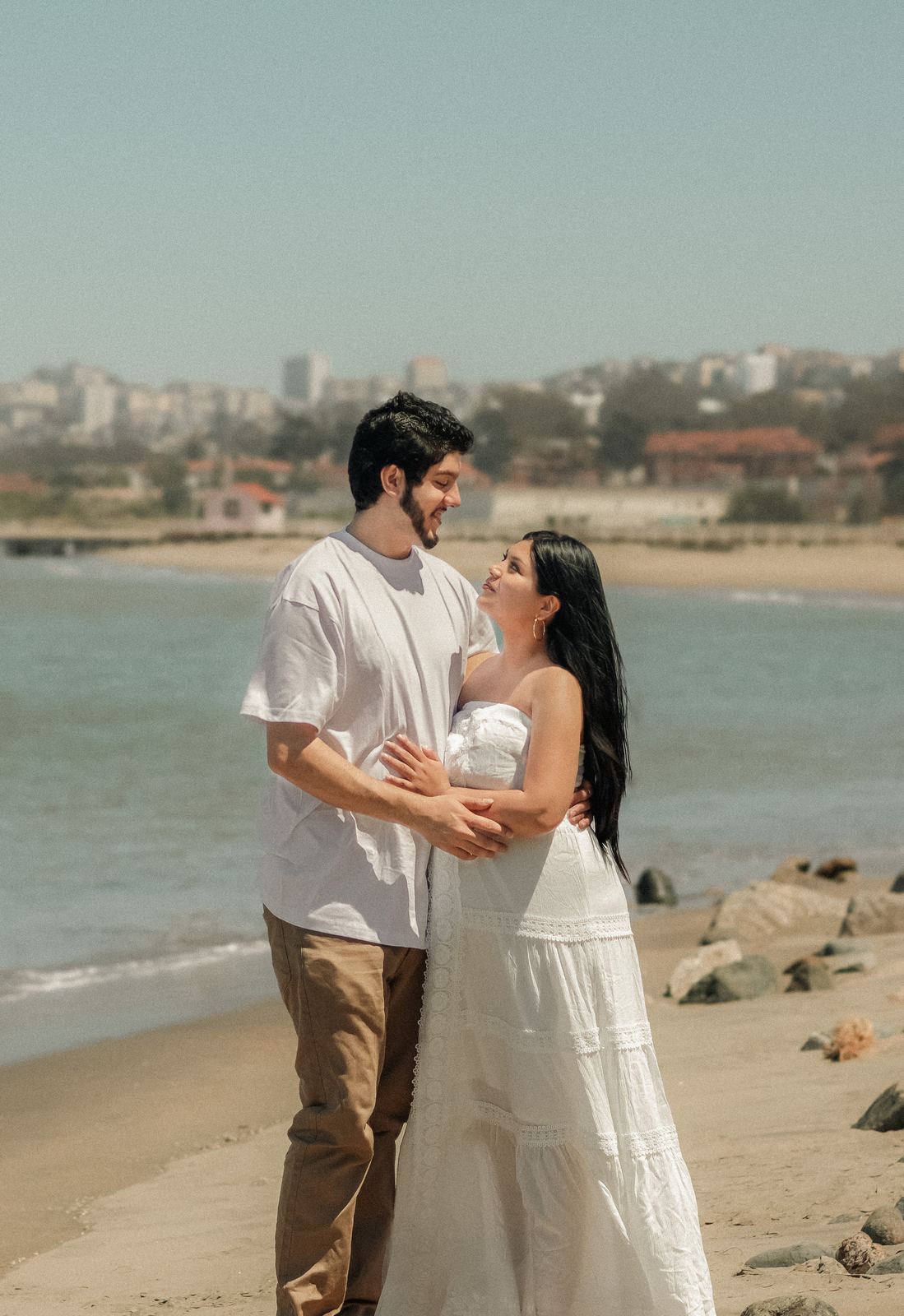 Couple embracing on a San Francisco beach